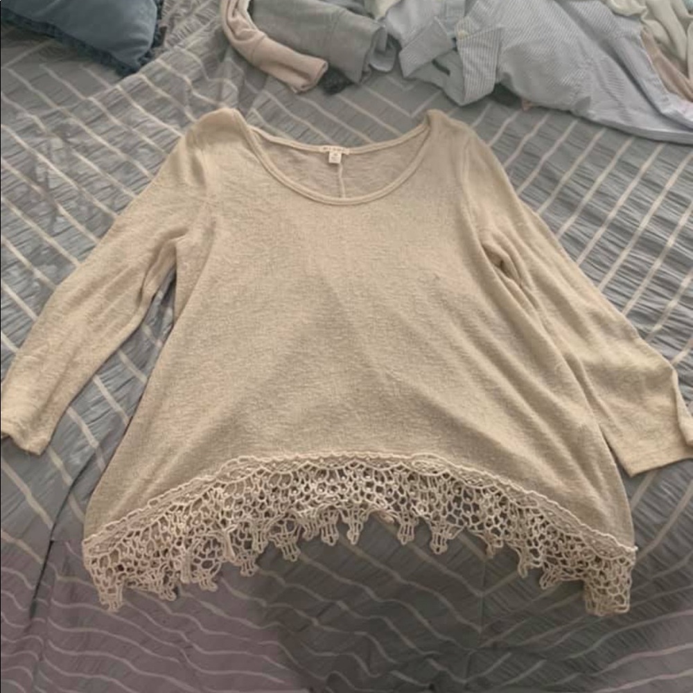 Cream top with detailed bottom
